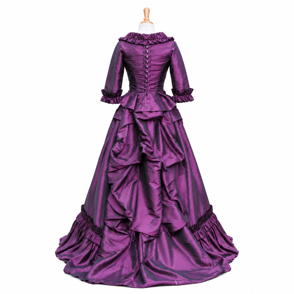 Back view of purple satin Victorian maid dress with corset back, cascading ruffles, long train and elegant gothic costume design