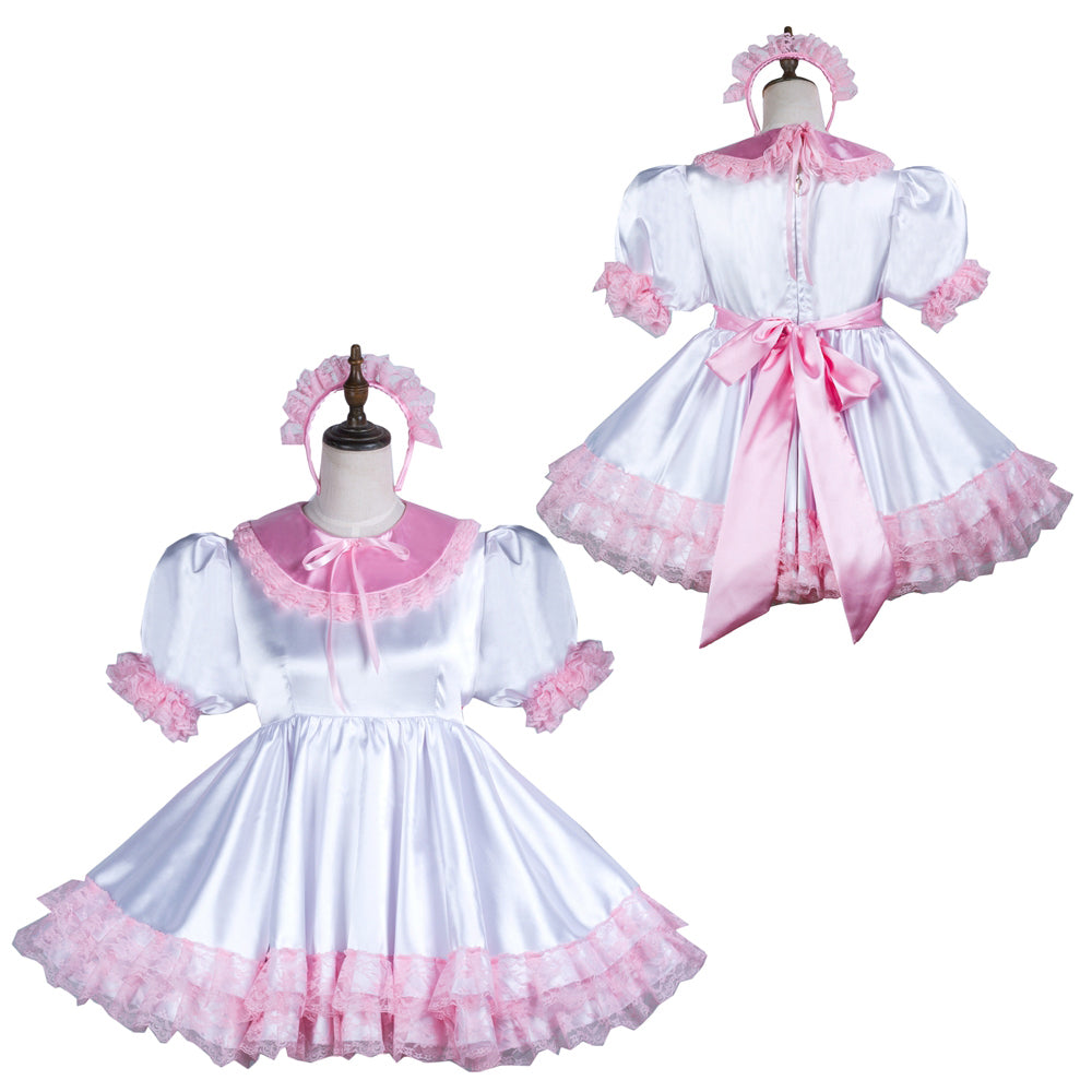 White and pink sissy maid dress with lace trim, puff sleeves, and matching headband, displayed on mannequins