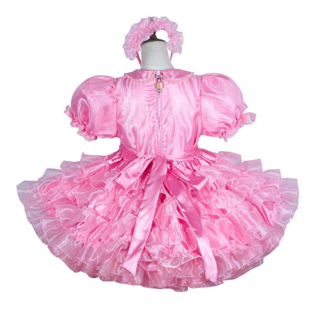 Pink sissy maid dress with ruffles, puff sleeves, and lockable back, displayed on mannequin with matching headband