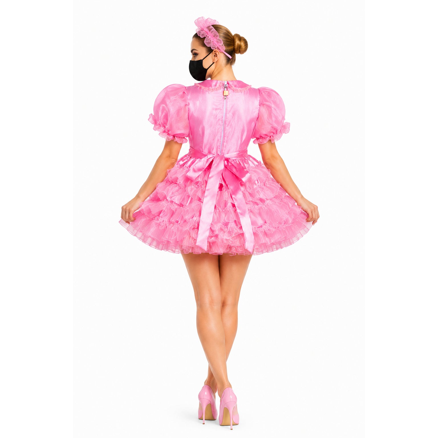 Pink sissy maid dress with ruffles, puff sleeves, and back zipper, paired with matching heels and headband