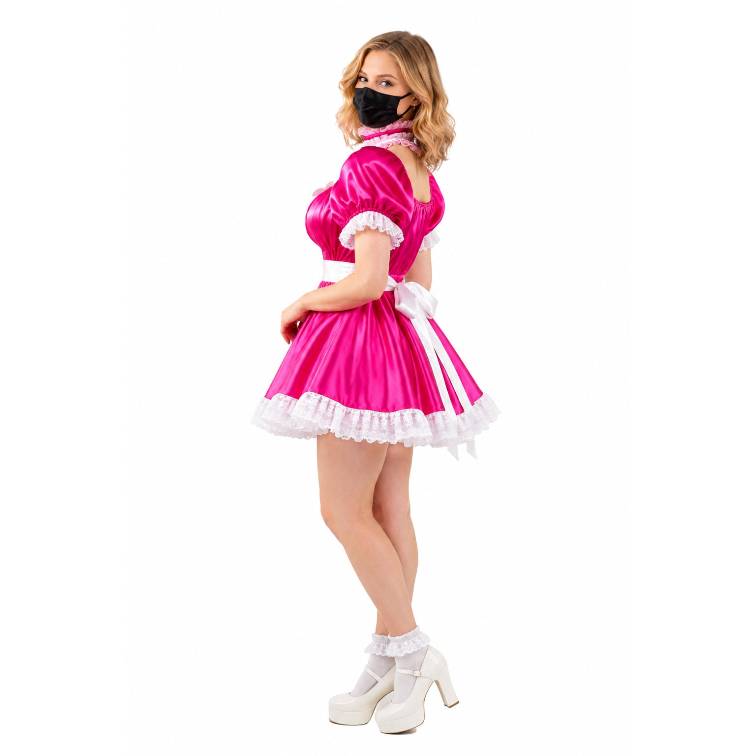 Pink sissy maid dress with white lace trim, bow, and platform heels
