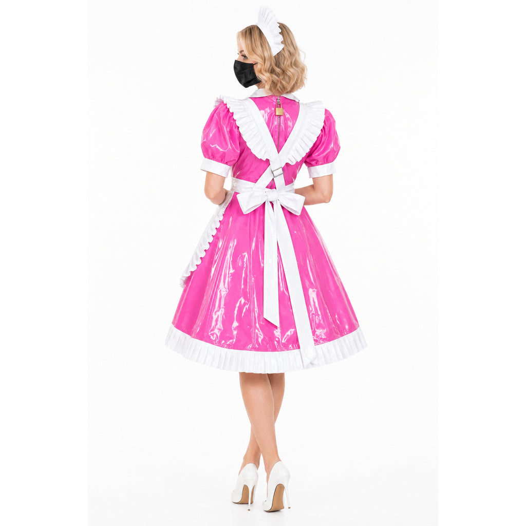 Pink PVC sissy maid dress with white ruffles, bow, and lockable back, paired with white heels