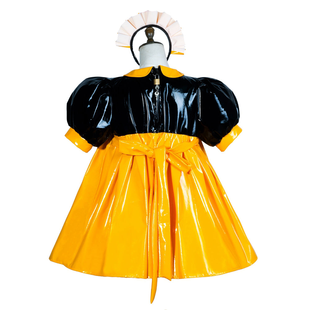 Black and yellow PVC sissy maid dress with puffed sleeves, bow waist, and matching headpiece