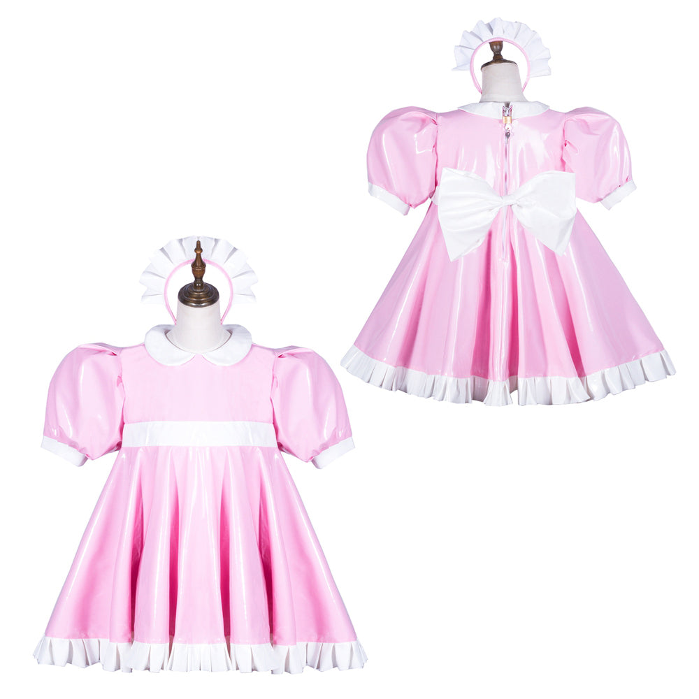 Pink sissy maid dress with white trim, puffed sleeves, and bow detail on mannequin
