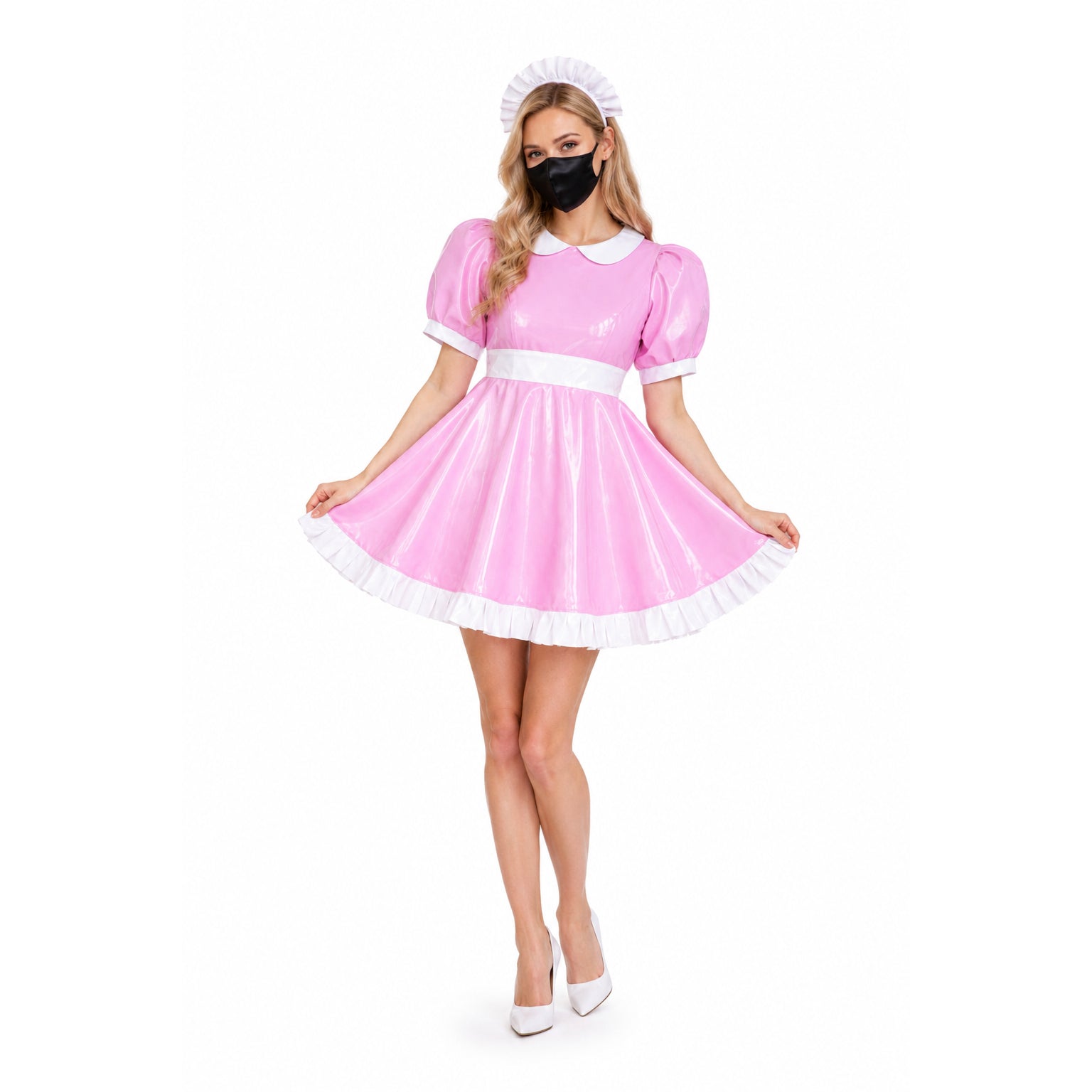 Pink PVC sissy maid dress with white trim, puffed sleeves, and matching hat, styled with heels and mask