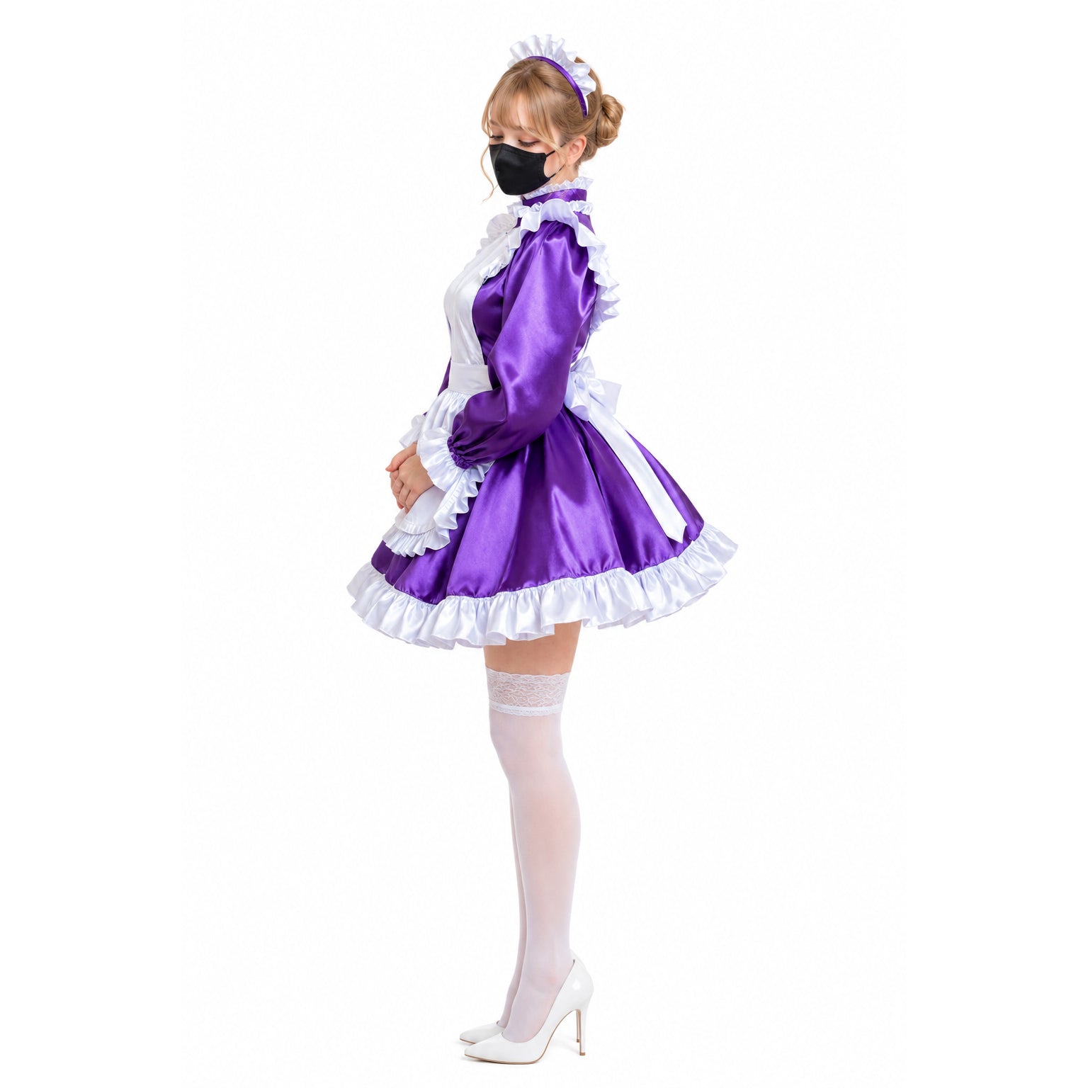 Purple sissy maid dress with white ruffles, satin finish, and lace stockings, styled with white heels and headband.