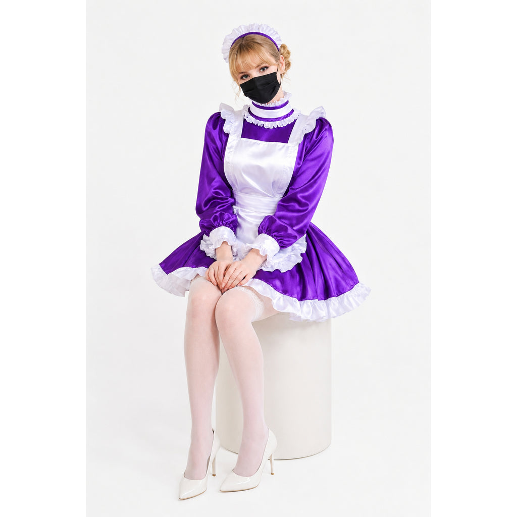 Purple sissy maid dress with white apron, ruffles, and matching headband, worn with white heels.