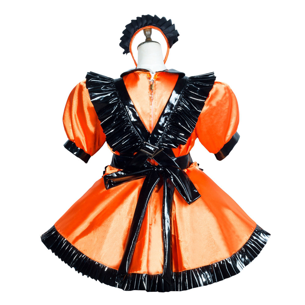 Orange and black sissy maid dress with PVC ruffles, satin skirt, and matching headband on mannequin