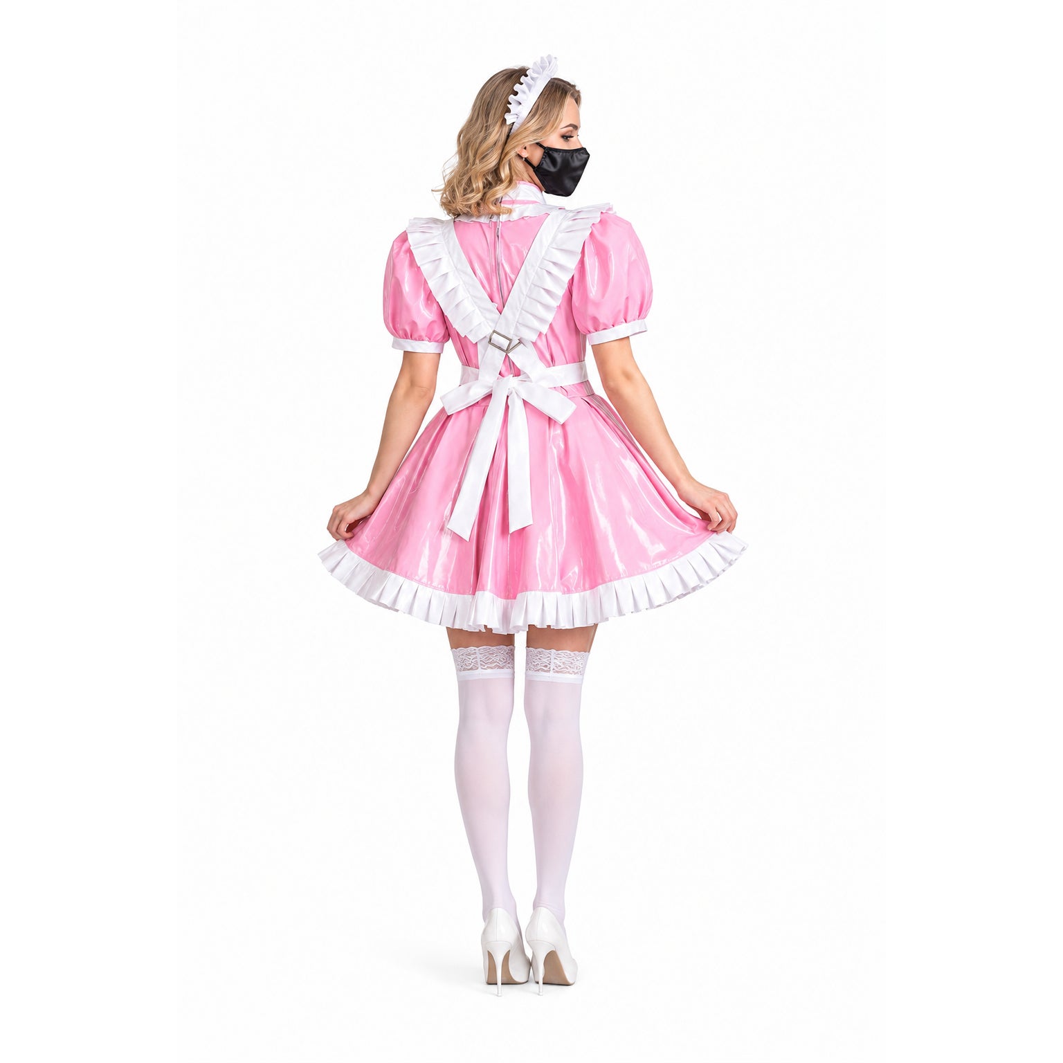 Pink sissy maid dress with white ruffles, bow, and PVC finish, shown from back with matching headband and stockings