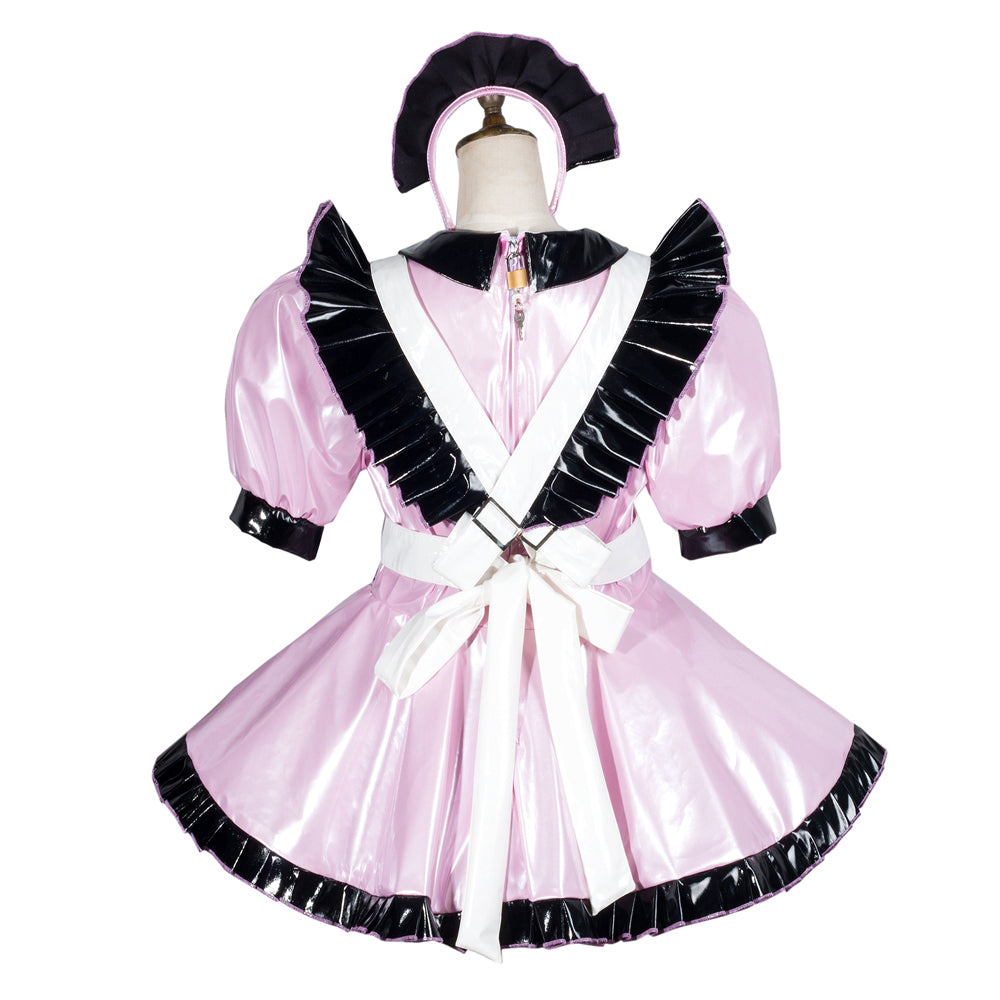 Pink sissy maid dress with black ruffles, white apron, and matching headpiece on mannequin