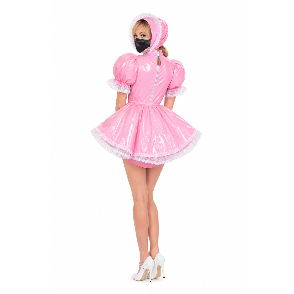 Pink PVC sissy maid dress with lace trim, hood, and back zipper, paired with white heels