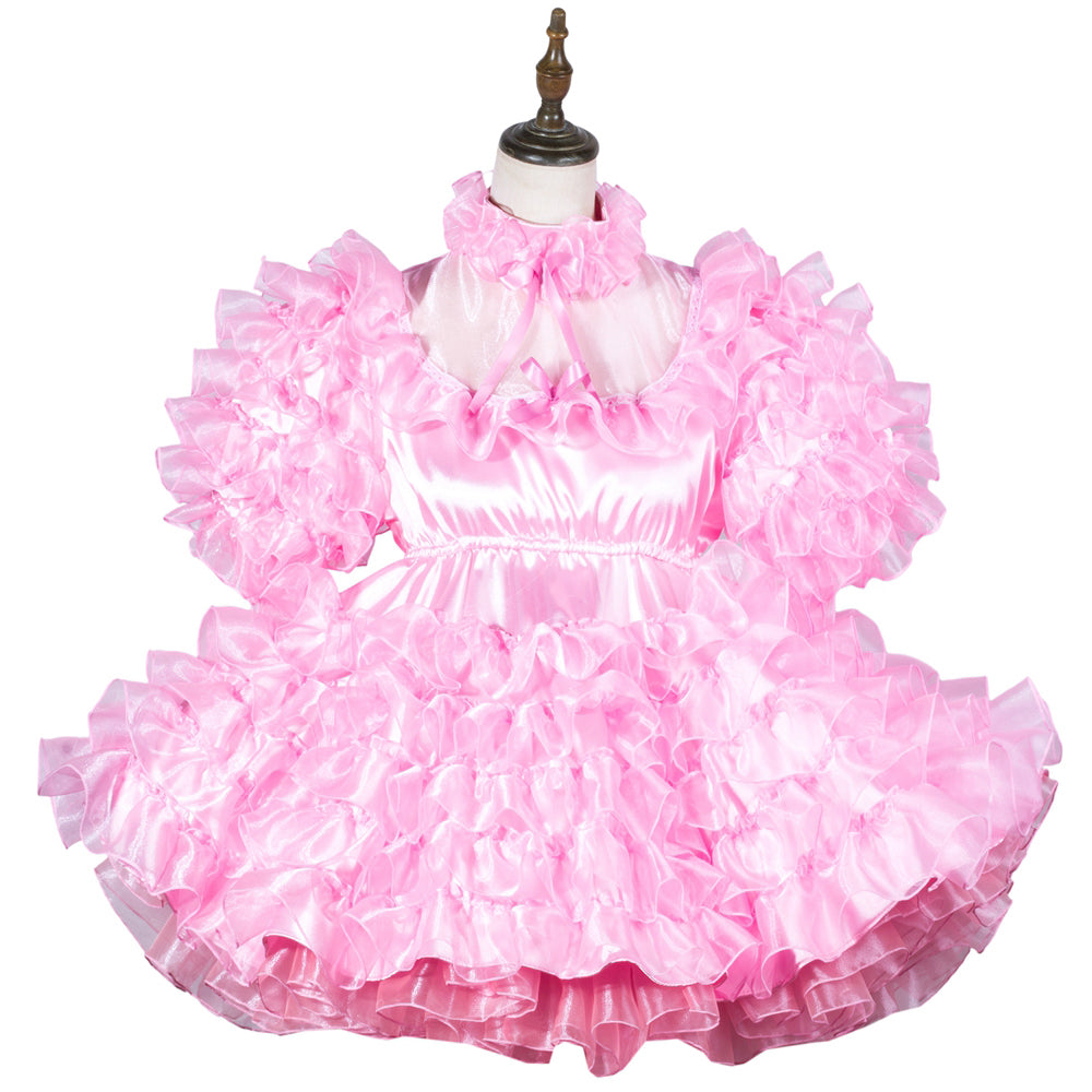 Pink sissy maid dress with ruffles, satin finish, and bow collar on mannequin