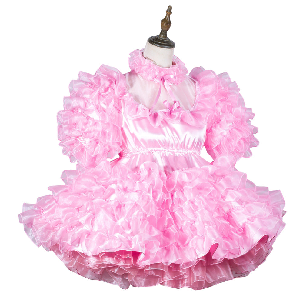 Pink ruffled sissy maid dress with satin finish and layered tulle skirt on mannequin