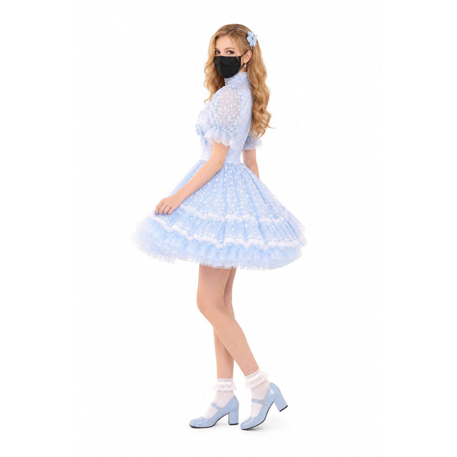 Light blue sissy maid dress with lace trim, puffed sleeves, and tiered tulle skirt, paired with matching heels.