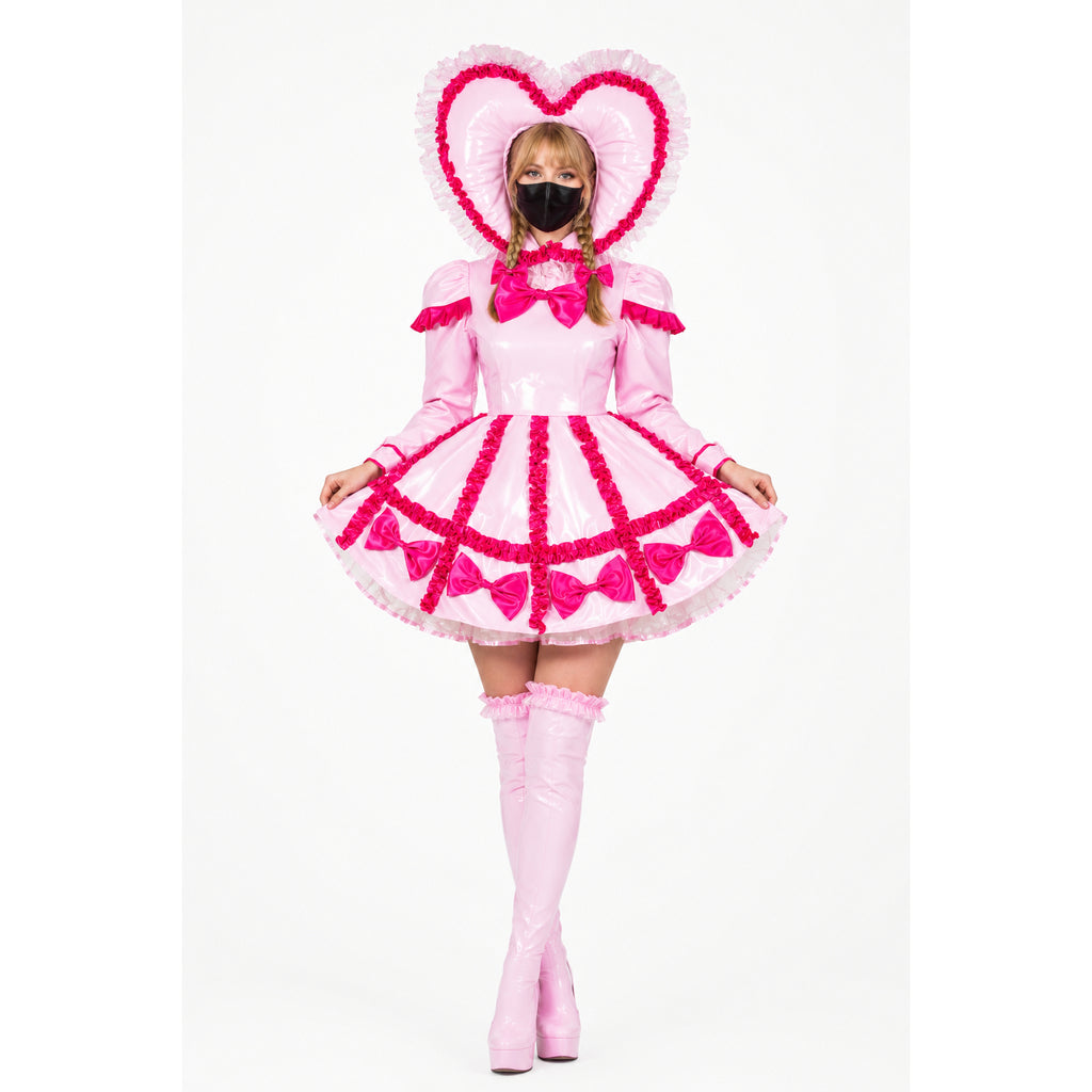 Pink sissy maid dress with heart hood, ruffles, bows, and thigh-high boots for costume fashion