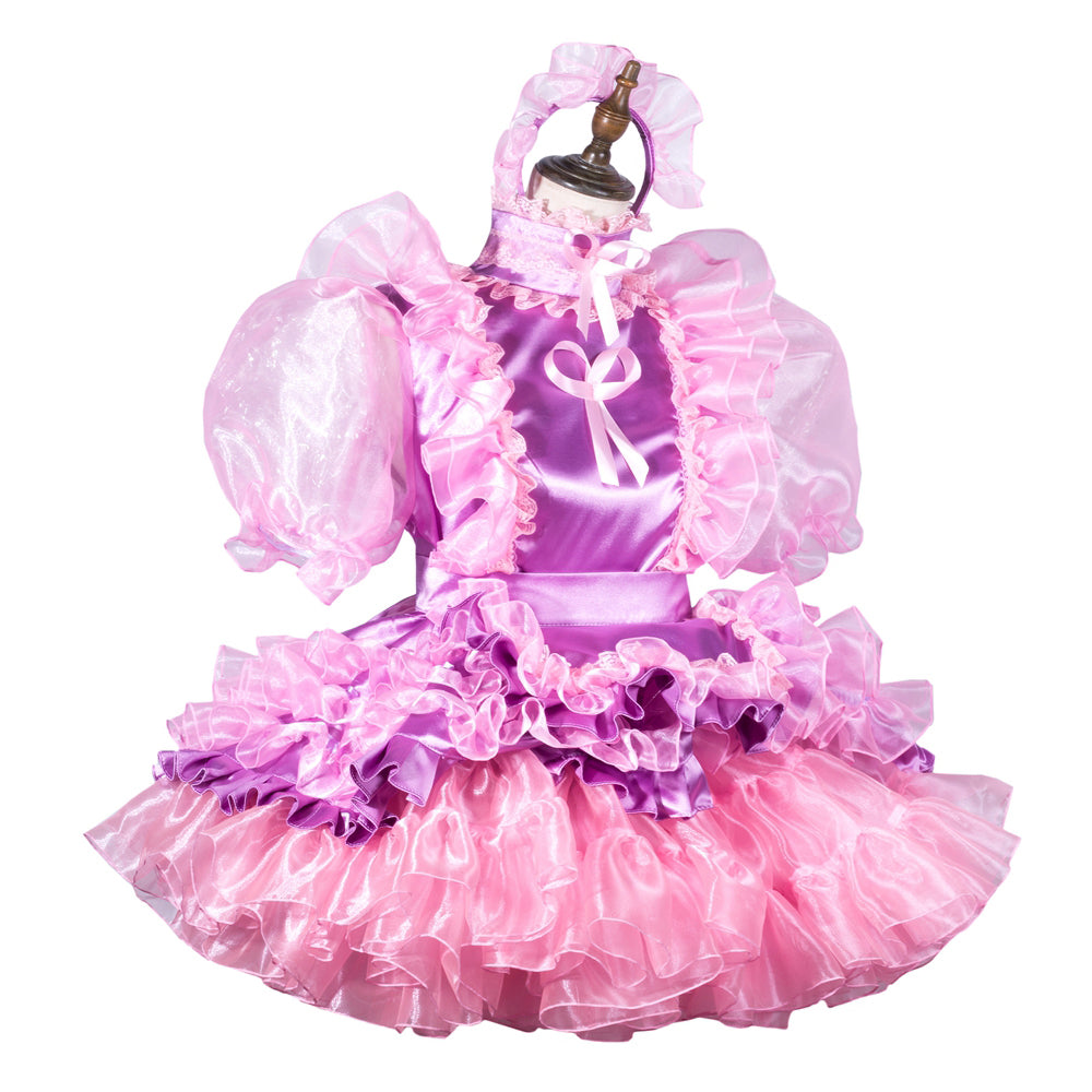 Pink and purple sissy maid dress with ruffles, puffy sleeves, and satin bow on mannequin