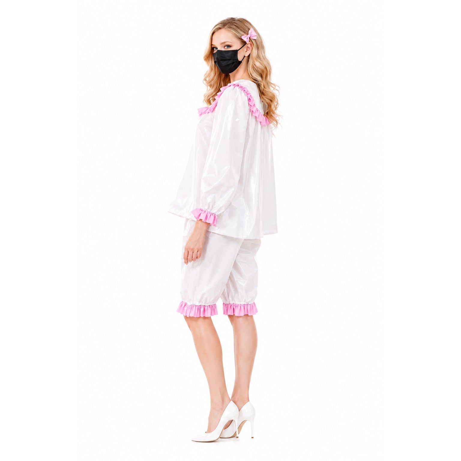 White PVC sissy maid dress set with pink ruffles, matching shorts, and heels