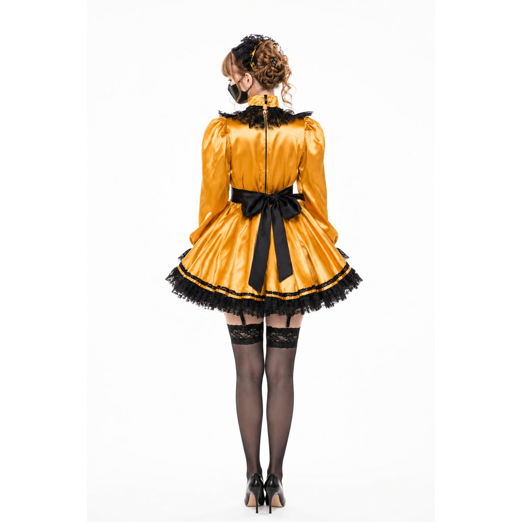 Gold sissy maid dress with black lace trim, bow, and stockings, back view