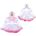 White sissy maid dress with pink ruffles, puff sleeves, and matching bonnet on mannequin