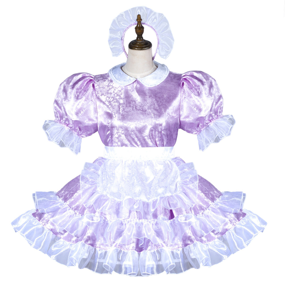 Purple sissy maid dress with ruffles, puff sleeves, and matching bonnet on mannequin