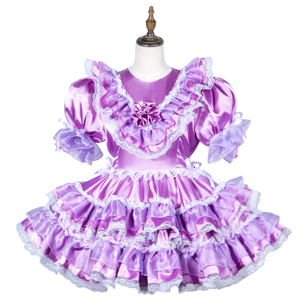 Purple sissy maid dress with ruffles, lace trim, and satin finish on mannequin
