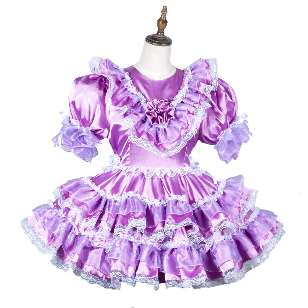 Purple sissy maid dress with ruffles, lace trim, and satin finish on mannequin
