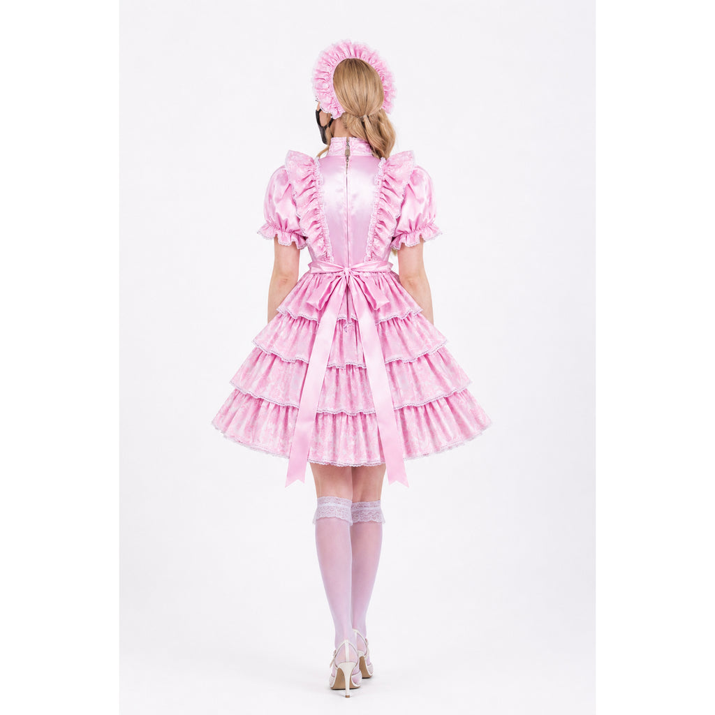 Pink sissy maid dress with ruffles, bow, and matching bonnet, shown from back