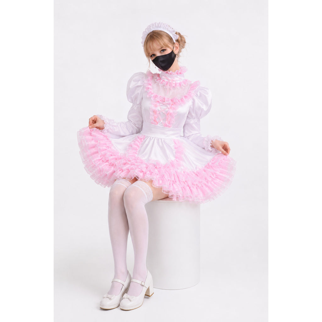 Pink and white ruffled sissy maid dress with lace trim, worn with white stockings and heels
