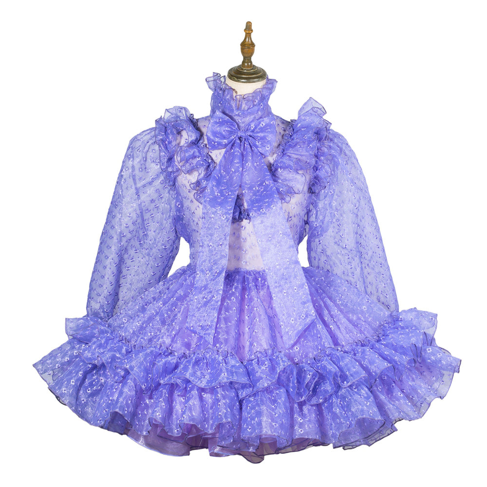 Purple ruffled sissy maid dress with bow, sheer long sleeves, and layered skirt on mannequin