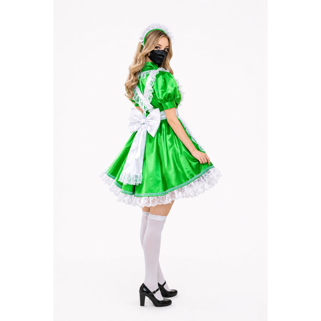Green sissy maid dress with white lace, bow, and apron, paired with white stockings and black heels
