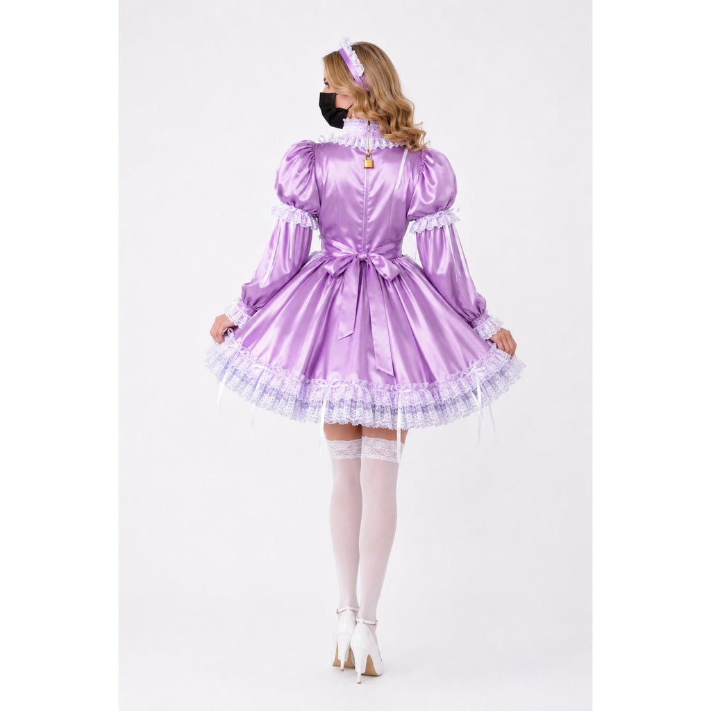 Purple sissy maid dress with lace trim, bow, and lock detail, paired with white stockings and heels