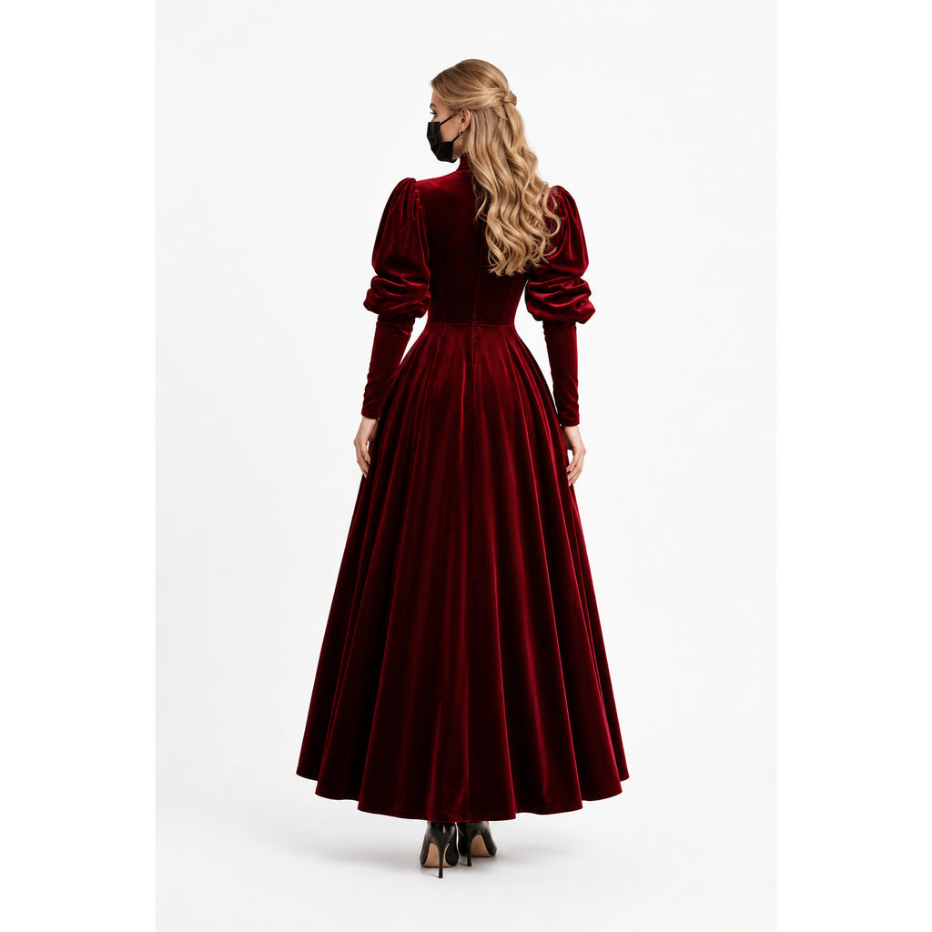Back view of woman in elegant burgundy velvet sissy maid dress with puffed sleeves and full skirt