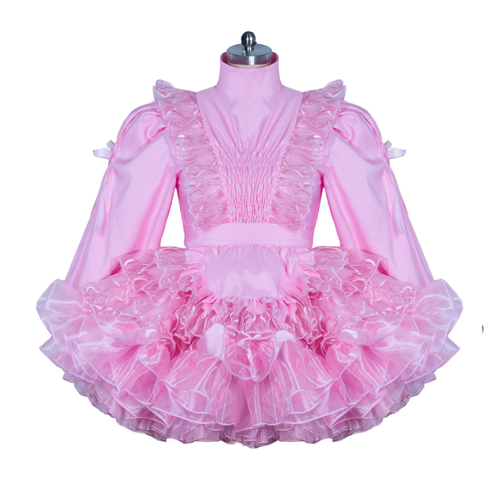 Pink sissy maid dress with ruffles, puffed sleeves, and layered tulle skirt on mannequin
