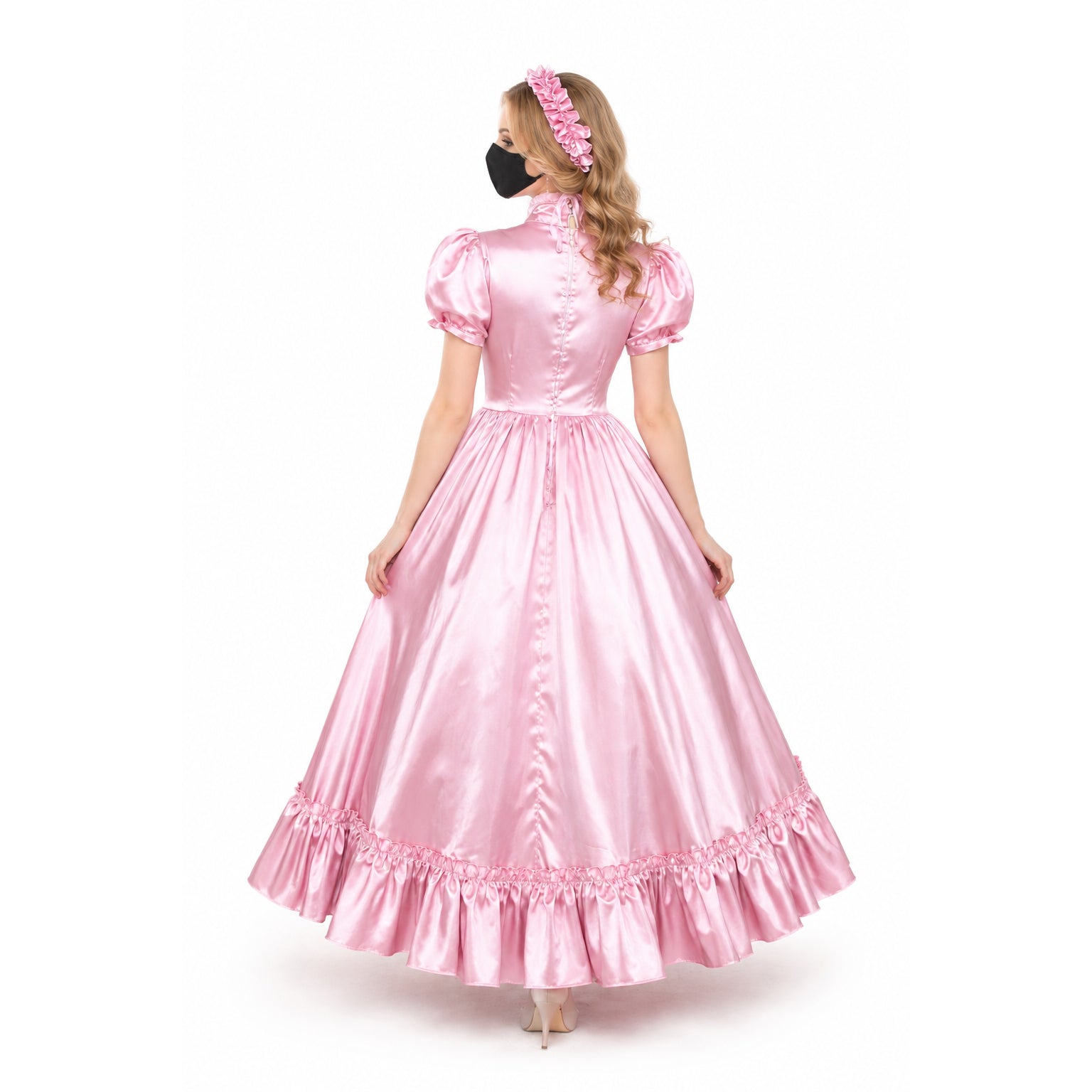 Pink satin sissy maid dress with ruffles, puff sleeves, and back buttons, shown from behind