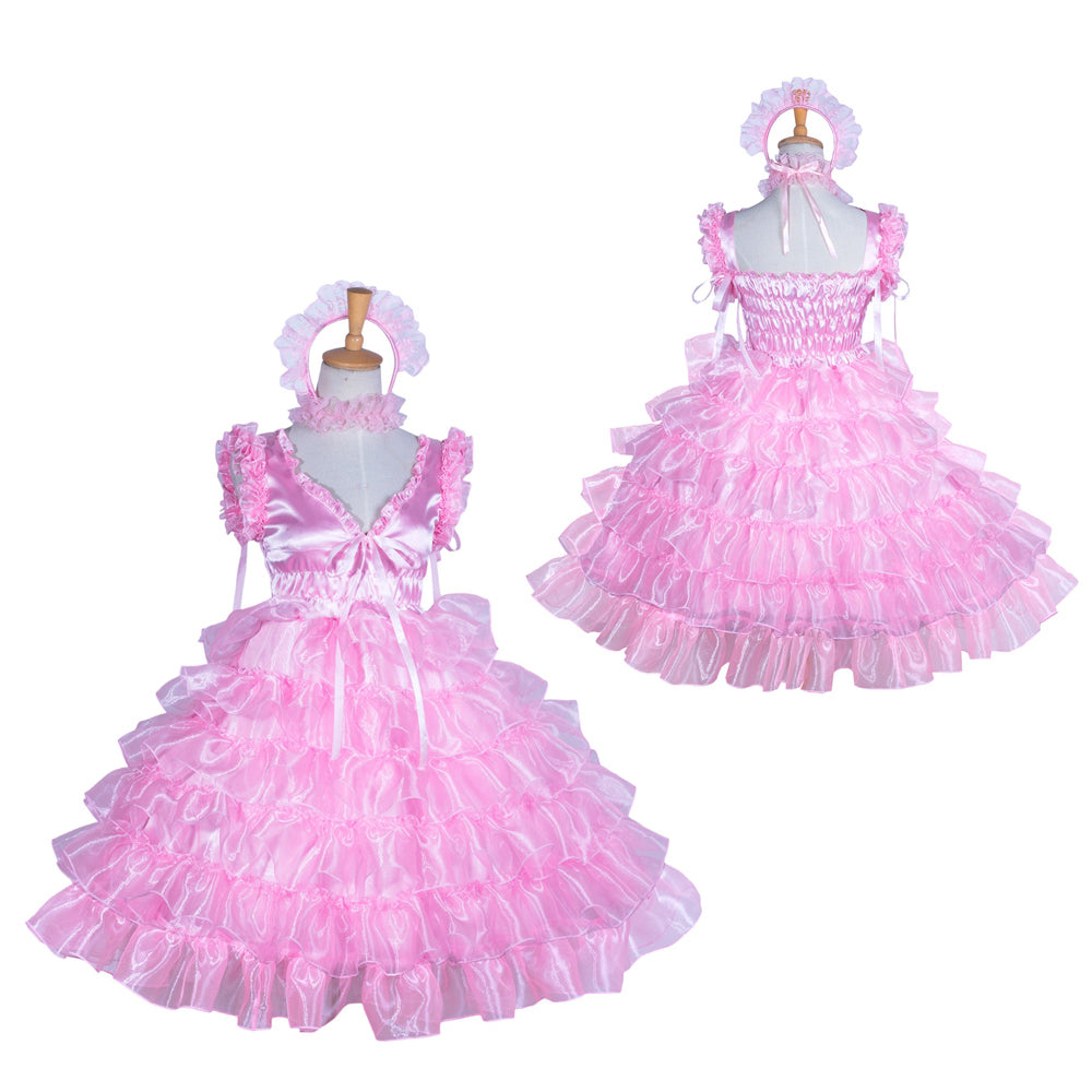 Pink sissy maid dress with ruffles, bow, and matching headpiece on mannequin
