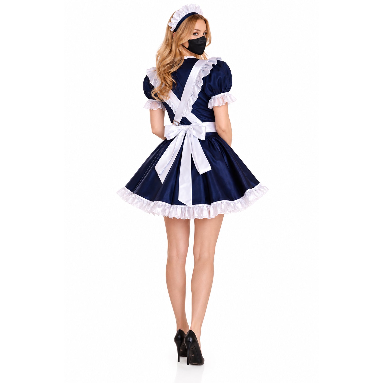 Navy blue sissy maid dress with white ruffles, apron, and headband, worn with black heels