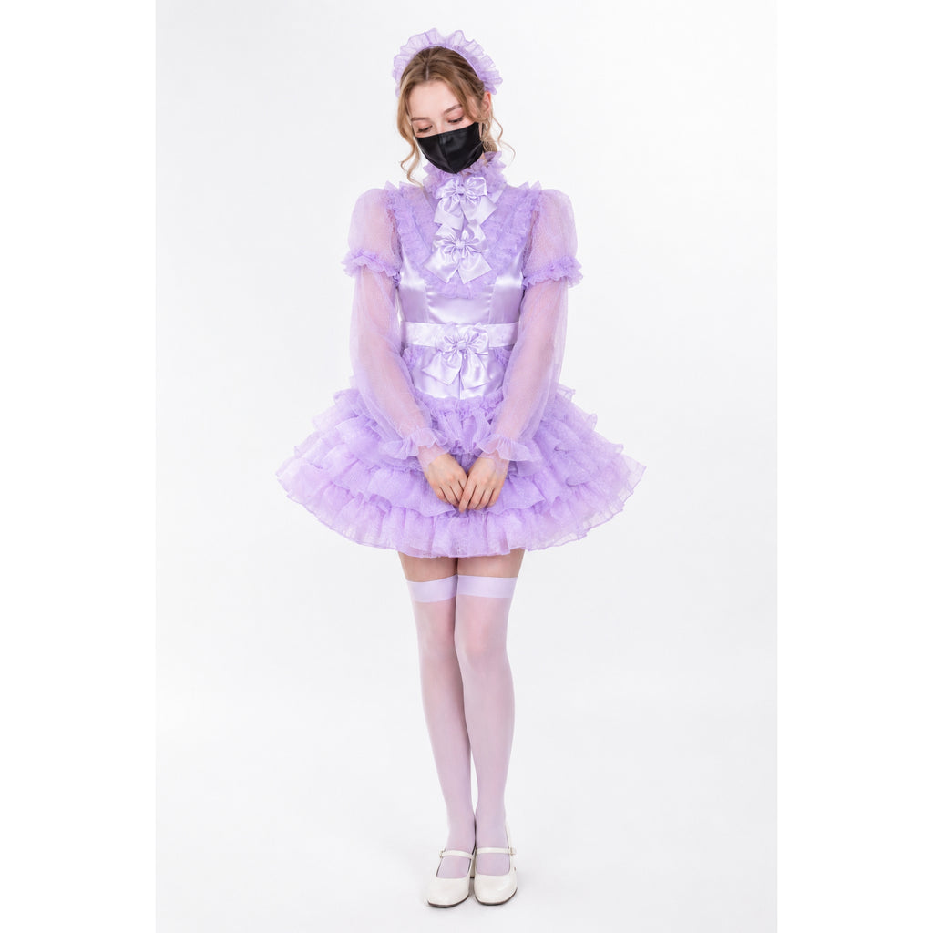 Lavender sissy maid dress with ruffles, sheer sleeves, and bow details, paired with matching stockings and heels.