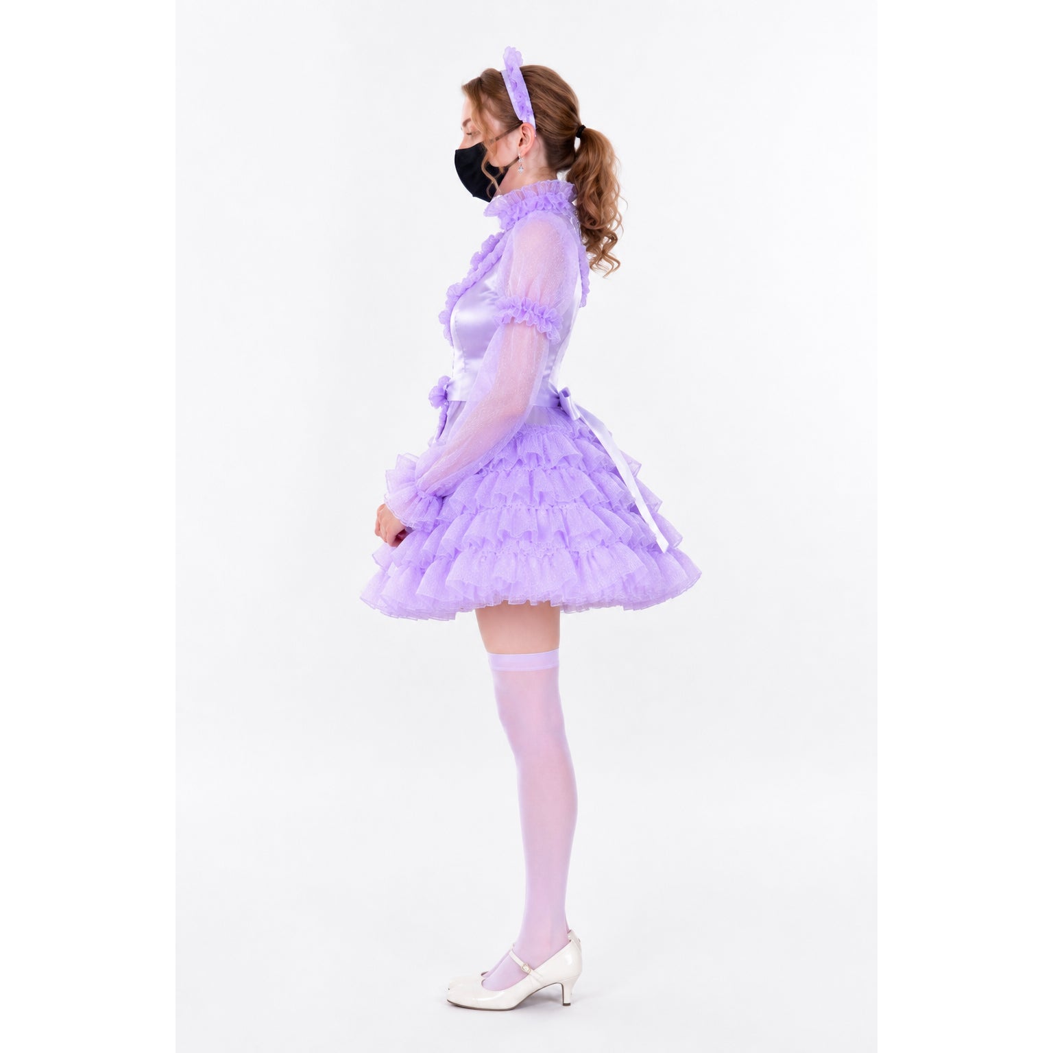 Lavender sissy maid dress with ruffles, sheer sleeves, and matching headband, styled with thigh-highs and heels