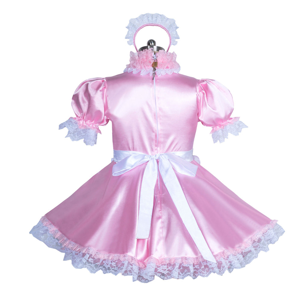 Pink sissy maid dress with lace trim, white bow, and matching headband, displayed on mannequin