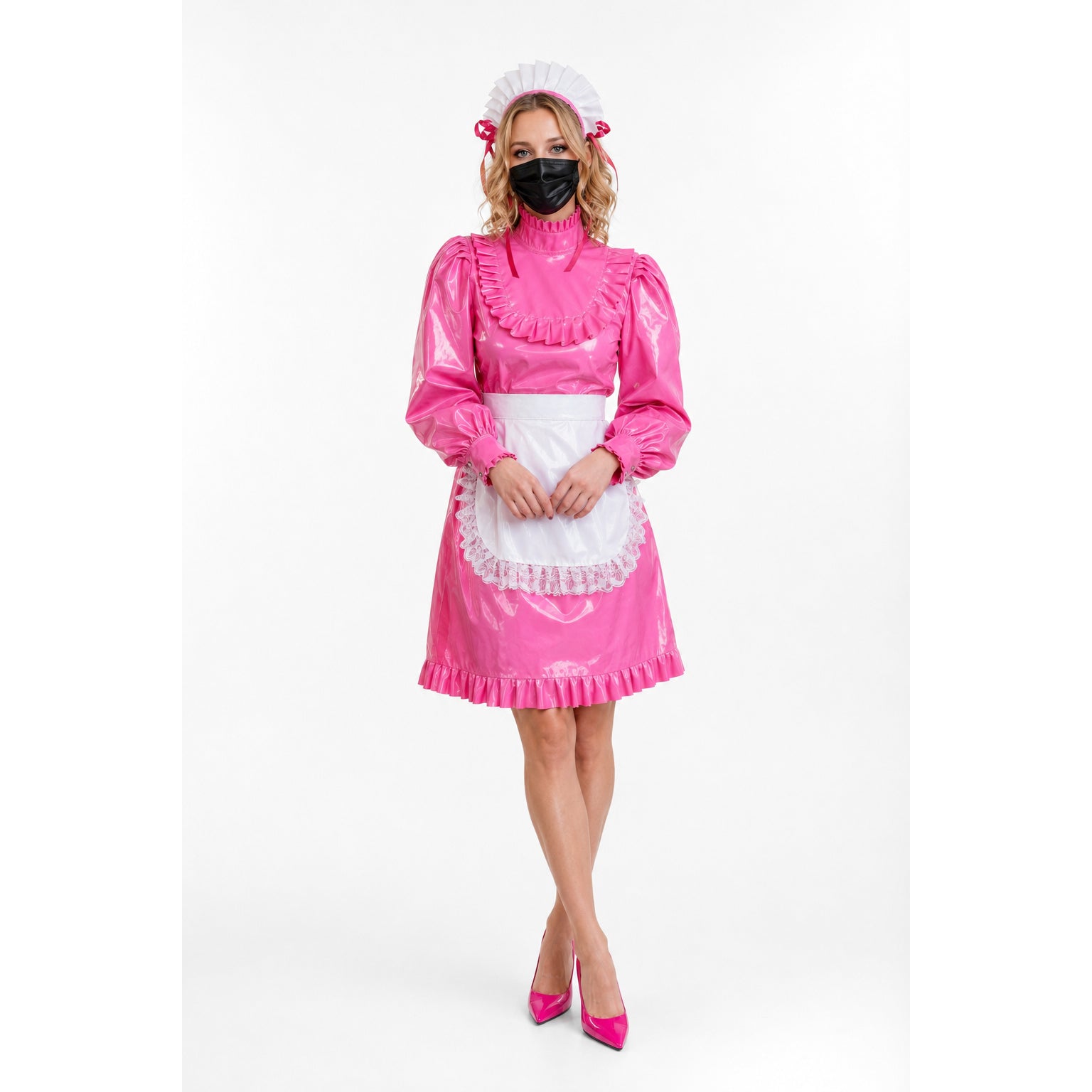 Pink PVC sissy maid dress with white apron, ruffles, and matching hat, styled with heels.