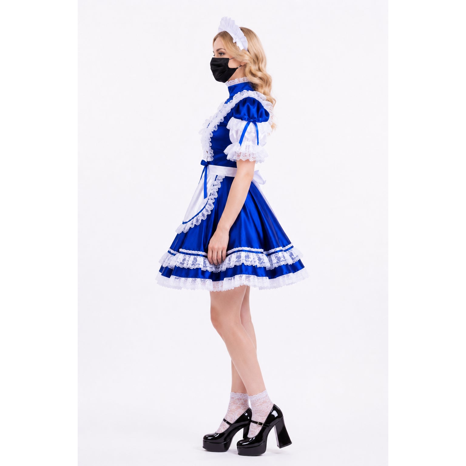 Blue sissy maid dress with white lace, apron, and headpiece, paired with black heels