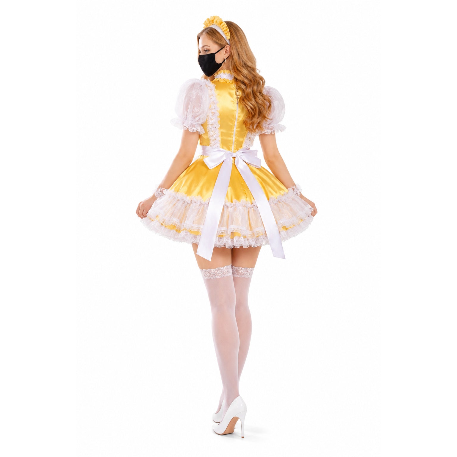 Yellow sissy maid dress with white lace, puff sleeves, and bow, paired with thigh-high stockings and heels