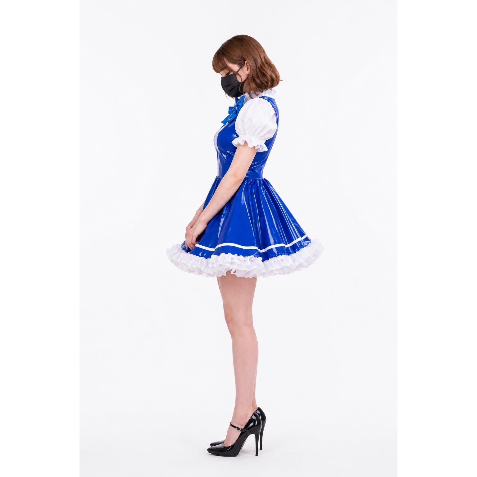 Blue PVC sissy maid dress with white ruffles, puffed sleeves, and high heels