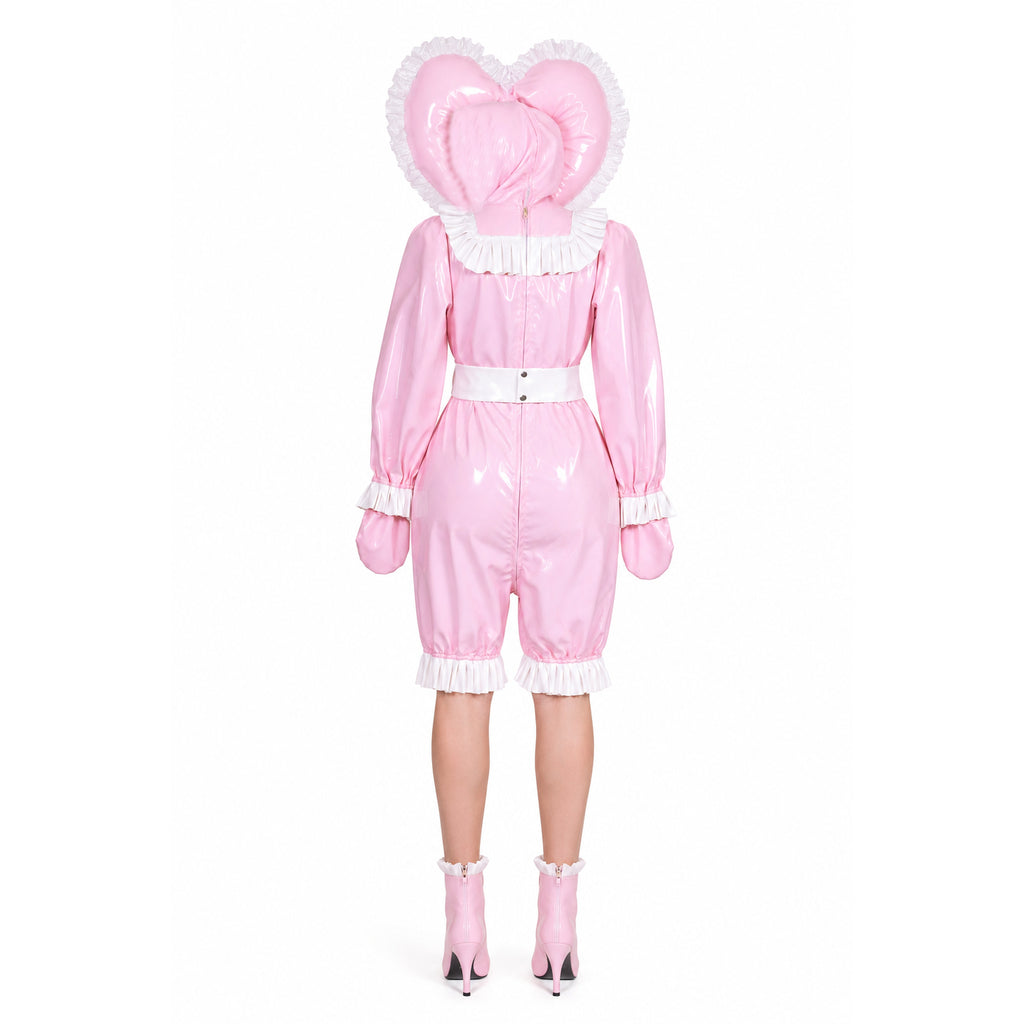 Pink PVC sissy maid dress with heart hood, white ruffles, and matching boots