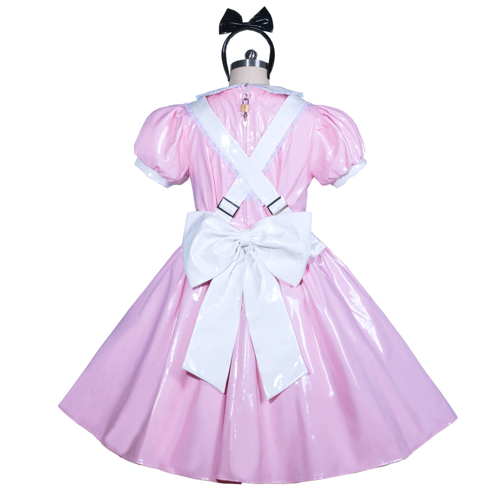 Pink PVC sissy maid dress with white bow, suspenders, and black headband