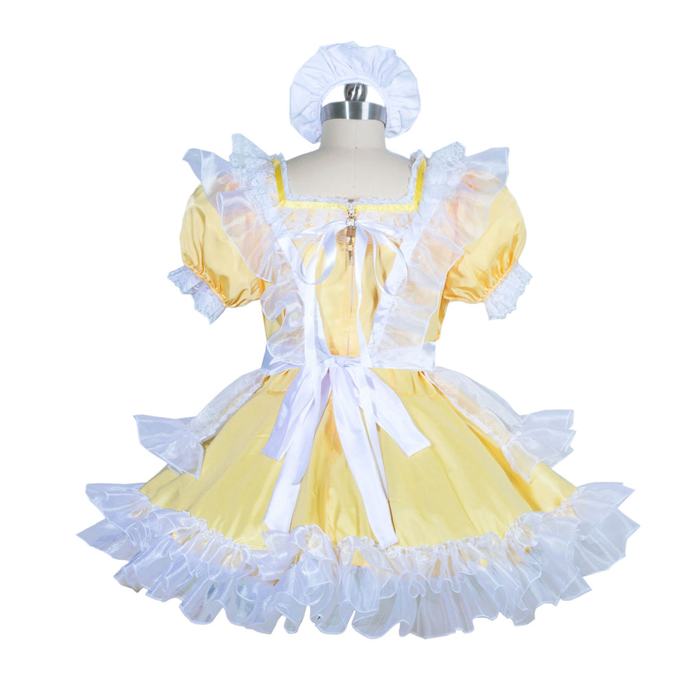 Yellow sissy maid dress with white ruffles, lace trim, and matching bonnet, displayed on mannequin