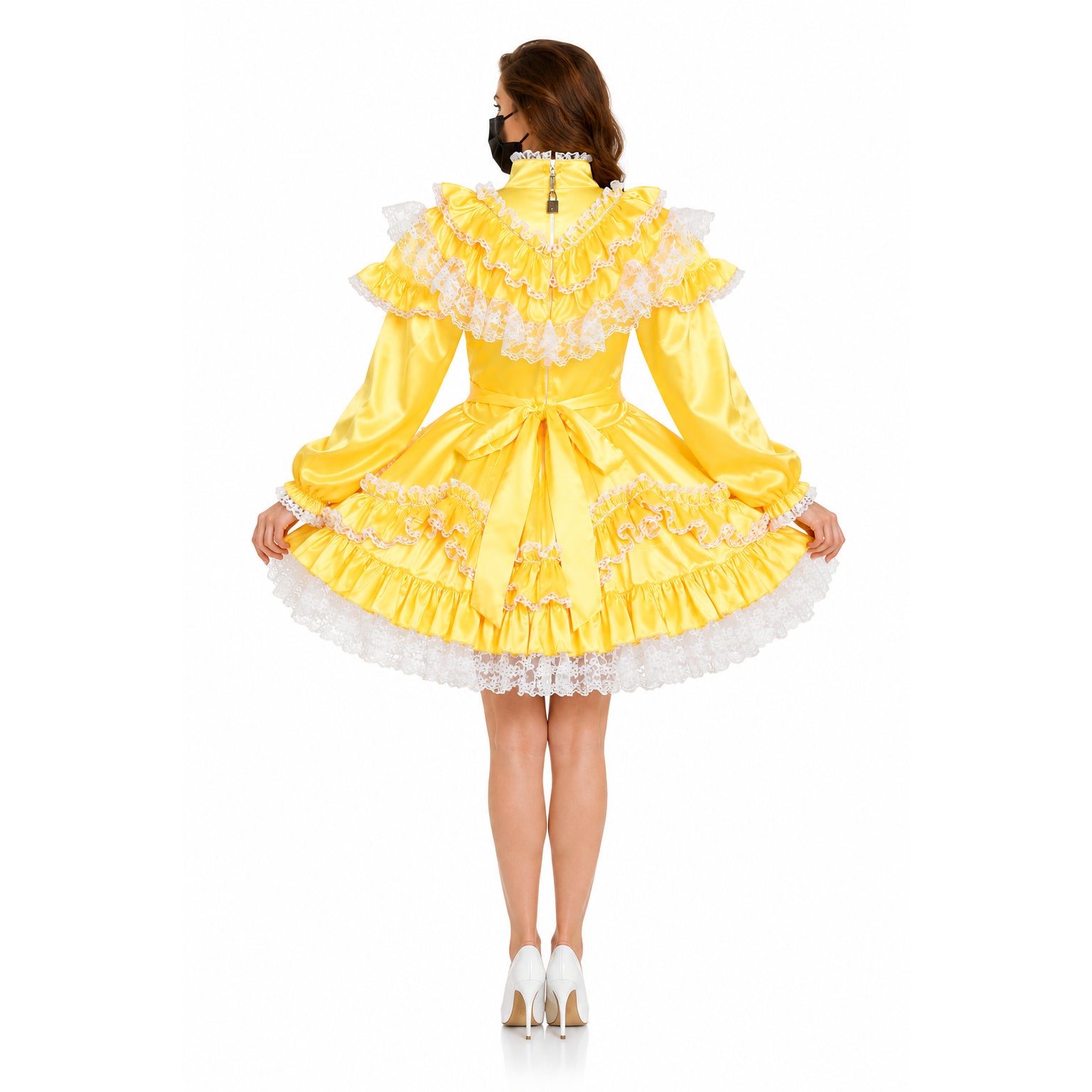 Yellow sissy maid dress with lace ruffles, bow, and lockable back, worn with white heels