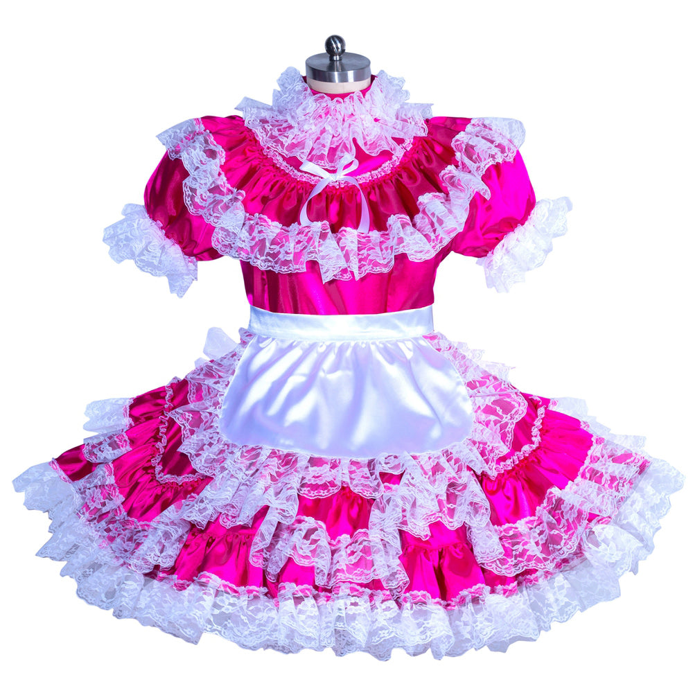 Pink sissy maid dress with white lace ruffles and satin apron, displayed on mannequin