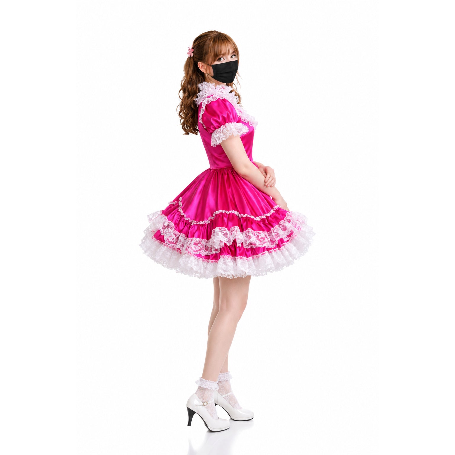 Pink sissy maid dress with white lace trim, satin finish, and ruffled skirt, paired with white heels