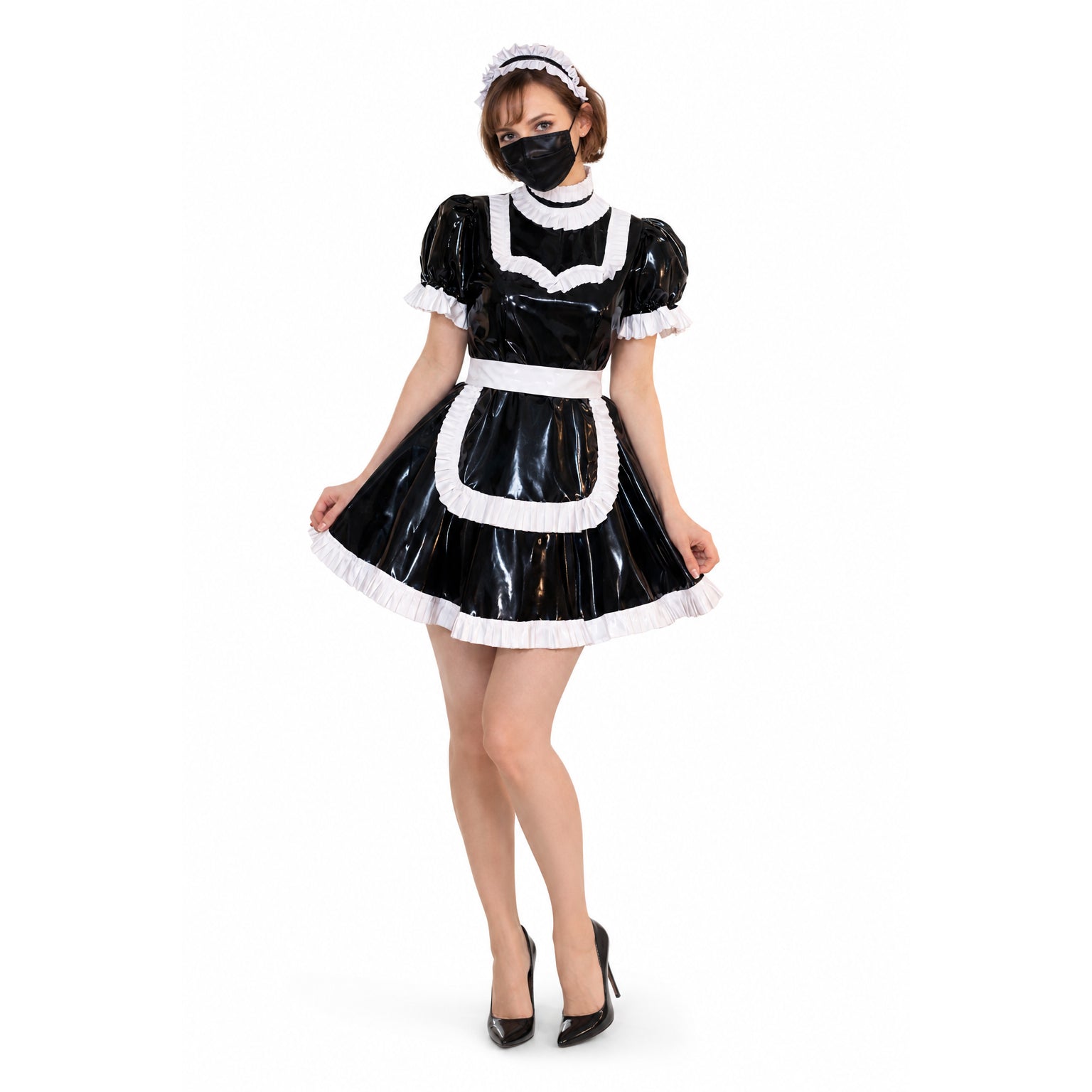 Black PVC sissy maid dress with white ruffles, apron, and headband, paired with heels